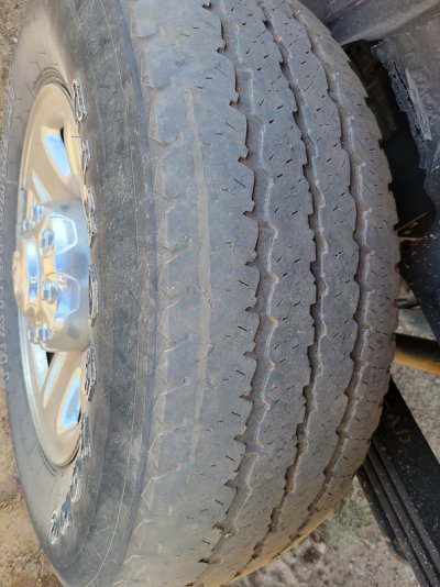uneven wear, appearing to show different compound on tread .jpg