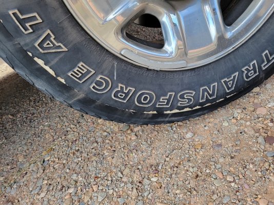 what appears to be a cut around entire circumference of tires.jpg