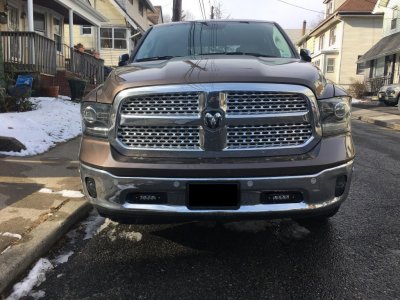 Ram grille swap options stock with Rigids in tow hook holes.jpg Ram grille swap options stock with Rigids in tow hook holes.jpg