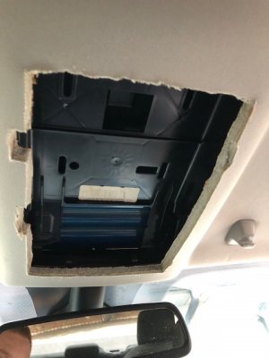 Pull down headliner and slide backing plate into place.jpg