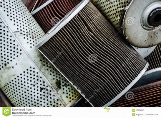 used-oil-filter-old-car-engine-close-up-35271910.jpg