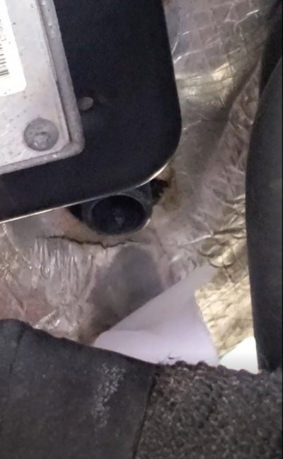 weep hole blowing with paper in front.jpg