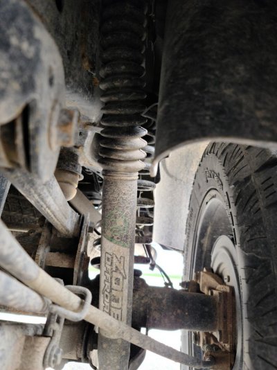 Driver rear shock to show how it should sit close to rear wheel well (2).jpg