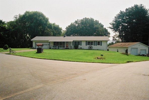 new windows, roof, bear pit as of 2021.jpg