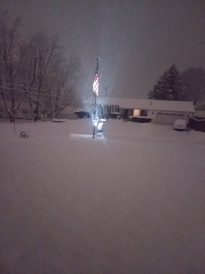 Looking @ Flag Pole in Snow Storm from Front Porch.jpg