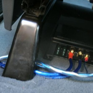 existing hole in the carpet is perfect for running wires with the amp under the driver's seat