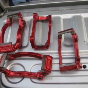 02 12 09 Brake Caliper Mounts Powdercoated Metallic Red