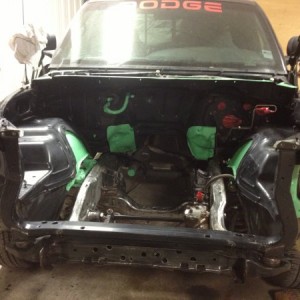 Engine bay being prepped for paint