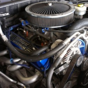 Dirty engine compartment after installing mid-length mopar headers.