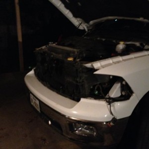Uninstalled stock headlights by taking off the grill first and then the headlights.
