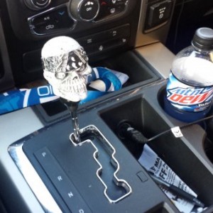 Aftermarket console shift knob.
