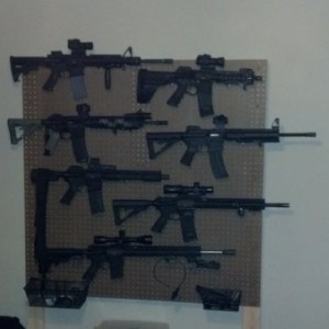 Wall beside the bed.