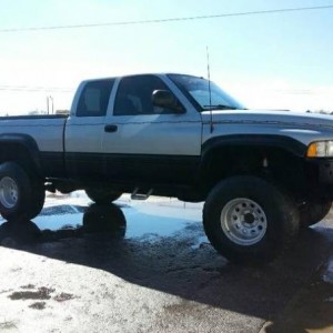99 dodge ram 1500 5.2 V8 over 6" lift sitting on 36"s