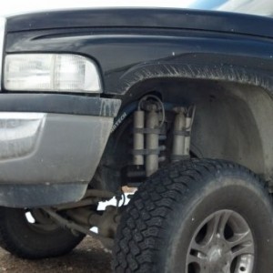 5 1/2" fab-tech long arm , also left the 3" coil spacer that was on it when I bought it... makes the 35's look pretty small