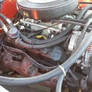 Still has the factory spark plugs and wires, sadly the plugs will have to be changed soon.