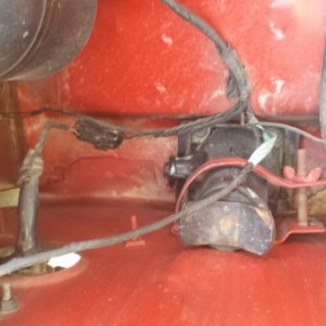 Stock, factory jack nestled in its home, the tools are also where they're supposed to be, don't think they've ever been used!