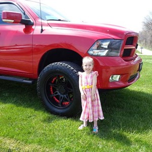 The 4 yr old with daddy's truck
