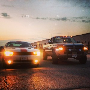My old truck beside my moms 2013 Challenger