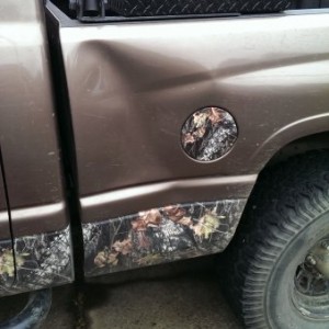 Dent from a idiot drunk who decided to kick in my truck then got his ass beat and got the cops called on him, now he's fixing both sides of my truck,