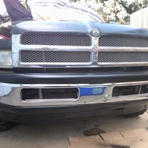 Painted my bumper plastics black and shined up the chrome.