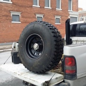 Refinished the wheels myself and started mounting the tires.