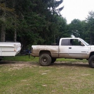 I miss the hell out of this pop-up camper. 6'' lift on 33x10.50 thornbirds and 8 lug dodge wheels.