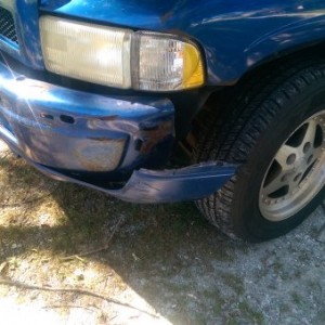 Before I zip tied my bumper back on temporarily until I can buy a new one.