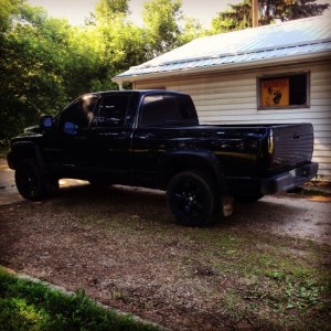 Plastidipped front and rear bumpers
Recon LED tail lights blacked out with VHT spray
5 Function Anzio 60" tailgate brake lightbar