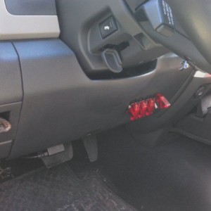 Four switches for airhorn, compressor, off-road lights, front camera.