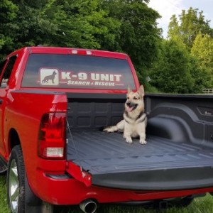 rear with K9 Black Jack. My soon to be 5 year old German Shepherd. He is a great Tracking Dog!  Rhino lined bed liner