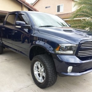 Bushwhacker painted to match flares at the three week mark. They cover the tires perfectly.