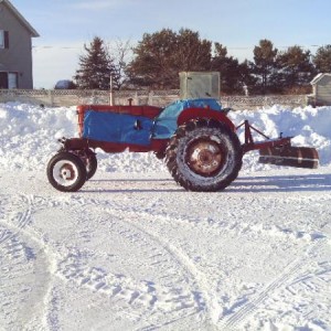 This is from the blizard of 2011, with a new windshield mounted on the heat houser. those rear tires are about 5 ft tall to give you an idea of how ta