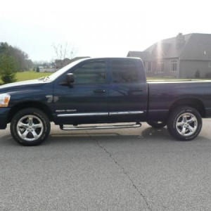 side shot - bought it off ebay
2006 1500 quad cab 4x4 with laramie package, bought with 32k miles
