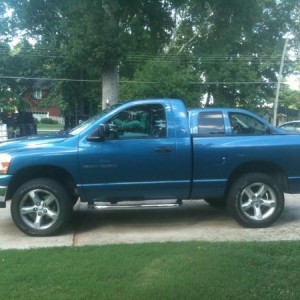 Side shot, my dad's 06 Ram 5.7L Hemi in the background (yep, same color.)