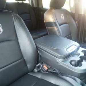 U-connect 5.0, backup camera, CD player under console and giant cup holders.