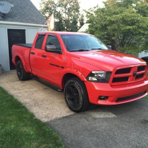 16 - Installed painted-to-match fender flares with black painted bolts to go along with red/black theme.