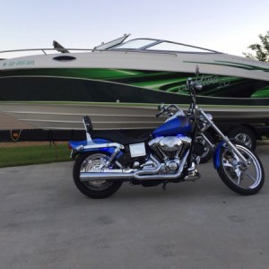 My boat and custom built harley davidson dyna low rider wid glide chopper