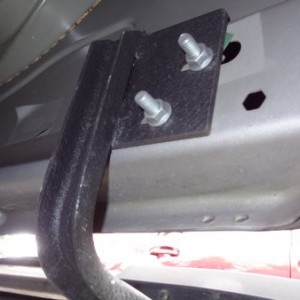 Passenger Side, rear bracket attachment