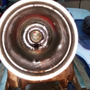 Inner pressure housing with seal (seal is about half way into the complete housing and seats between the pressure chamber and pinion housing) This is