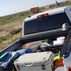 Truck loaded down with work crap