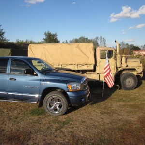 My 06 Ram next to my buddies M35A3.