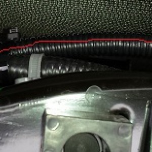 Routing in front of the radiator with the factory Front Module harness