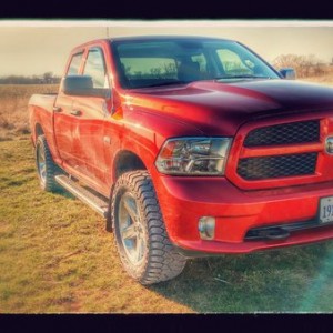 Front quarter, new tires, Amp Terrain Grippers, 305/55/r20
Would have been a nice picture if my truck was actually clean.