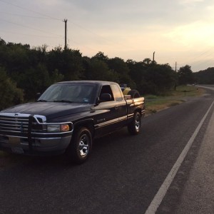 Old picture with street legal quad in back