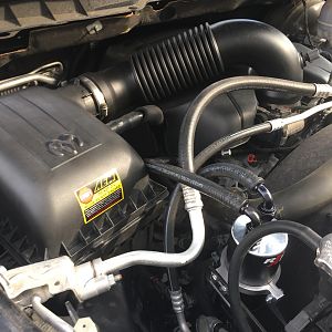 Engine bay w/ new catch can and AEM filter