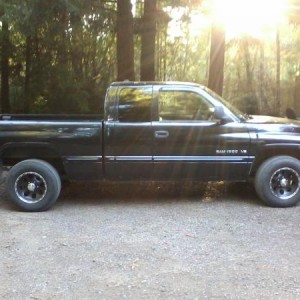 The side veiw of my 99 Dodge Ram 1500 with my new Eagle Alloy wheels.