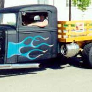 My dad's 1936 International pulling into Quad Cities Cruisers carshow in Davenport Iowa at Mississippi Valley Fairgrounds. This was his first vehicle