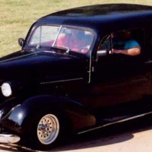 Us in dad's 1937 Chevy pulling into Vintage Rodders BlackHawk carshow in Moline Illinois.