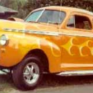 My grandpa's 1941 Chevy coupe ( Orange Blossom Special ) .