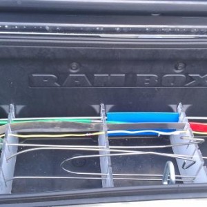 Filling up the Rambox with my lockout tools.  Will be painting those lexan dividers I made black so they blend a bit better.